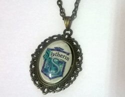 Медальон Harry Potter Slytherin 4х3 см.